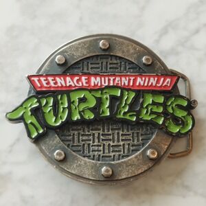 TMNT Belt Buckle 2008 Mirage Studios Teenage Mutant Ninja Turtles Manhole Cover